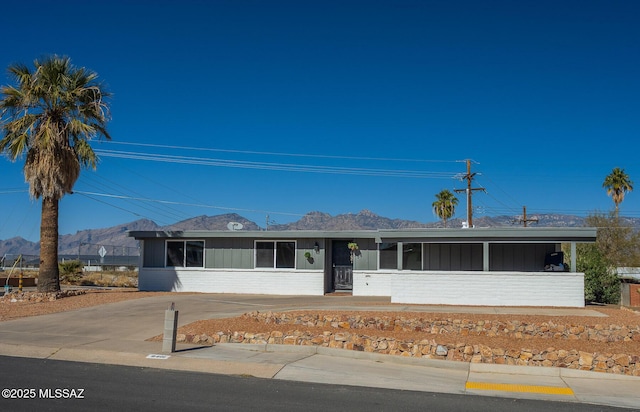 view of front of home with a mountain view