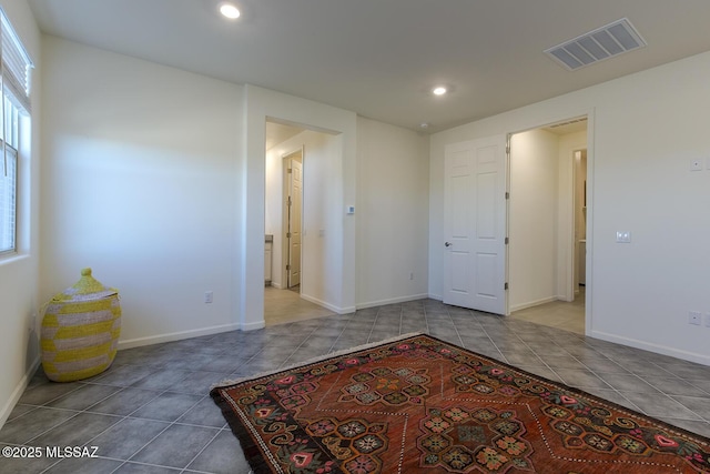 view of tiled spare room