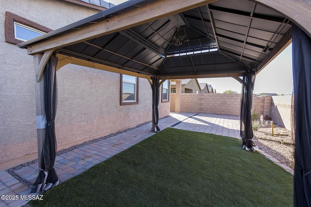 exterior space with a patio area and a gazebo