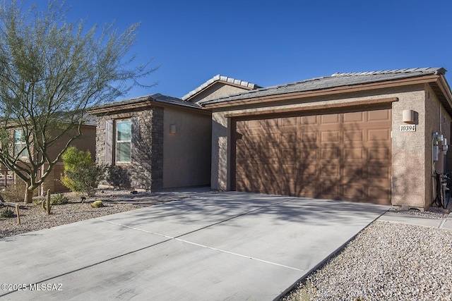 view of front of property with a garage