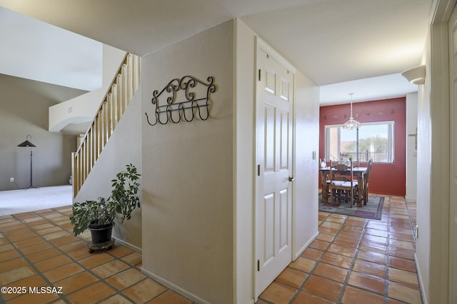 hall featuring tile patterned flooring