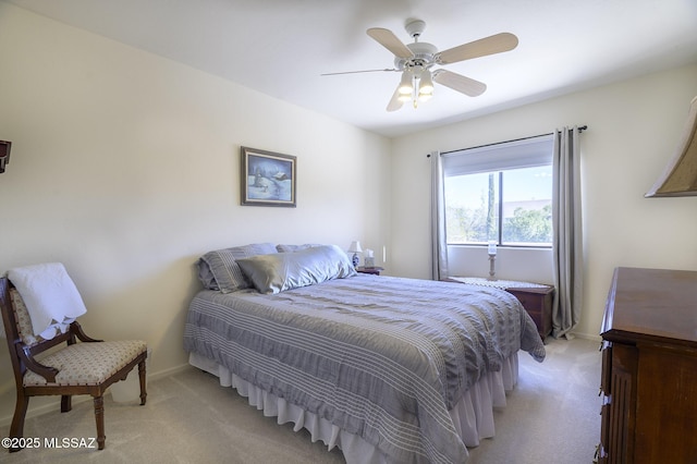 bedroom with light colored carpet and ceiling fan