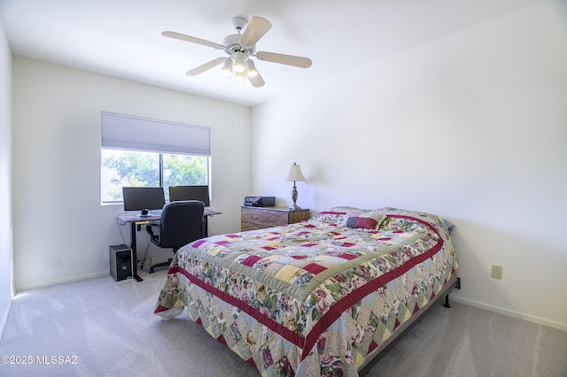 bedroom with light carpet and ceiling fan