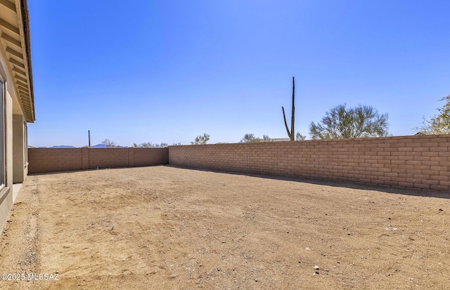 view of yard featuring a fenced backyard