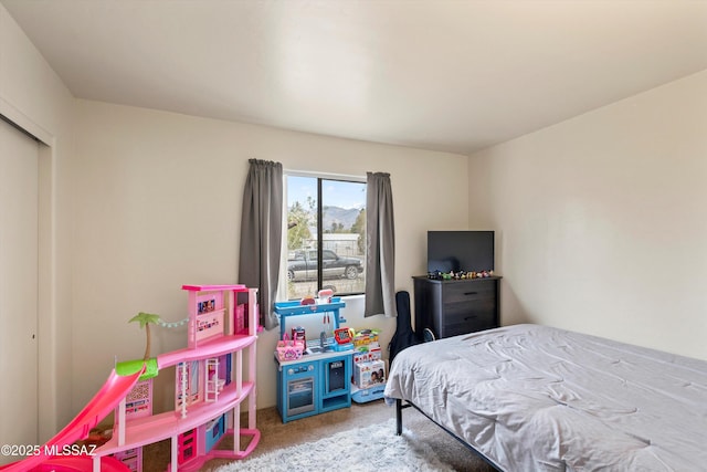 bedroom featuring carpet flooring