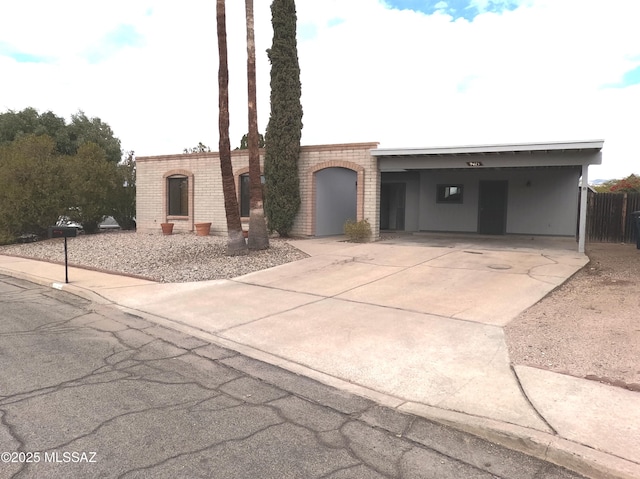 view of front facade with a carport