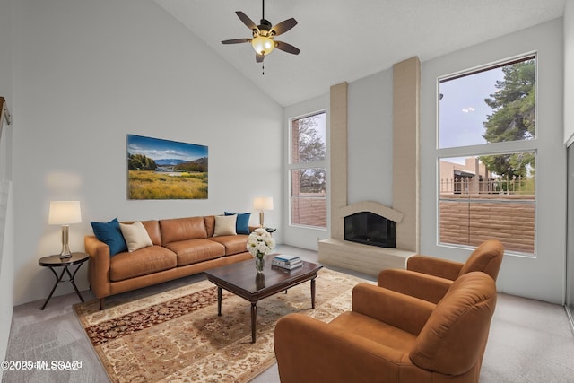 living room featuring light carpet, high vaulted ceiling, a wealth of natural light, and ceiling fan