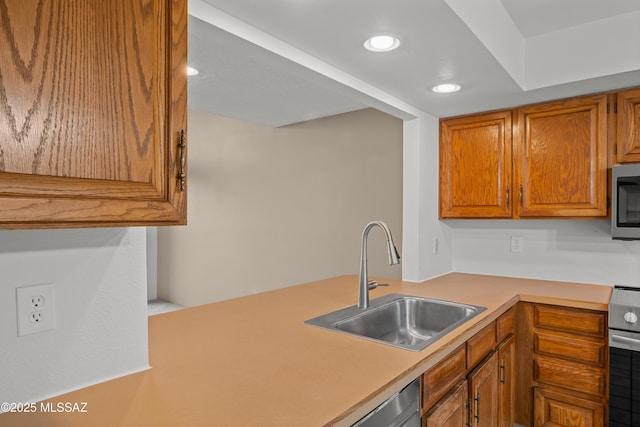 kitchen featuring range and sink