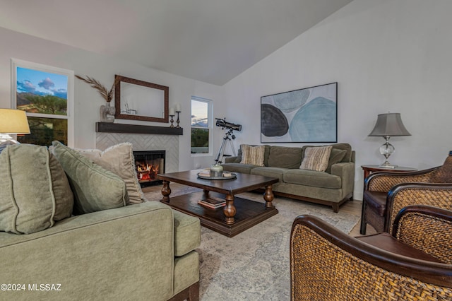 living room featuring hardwood / wood-style floors and lofted ceiling