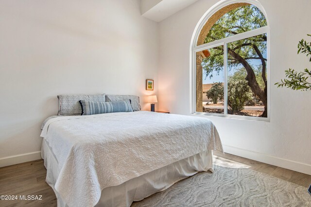 bedroom featuring hardwood / wood-style floors