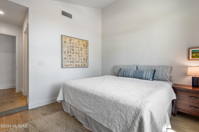 bedroom with light wood-type flooring