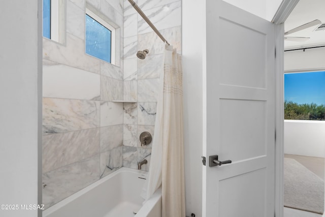 full bath with shower / bath combination with curtain