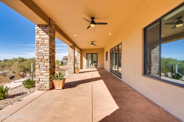 view of patio with ceiling fan, french doors, and fence