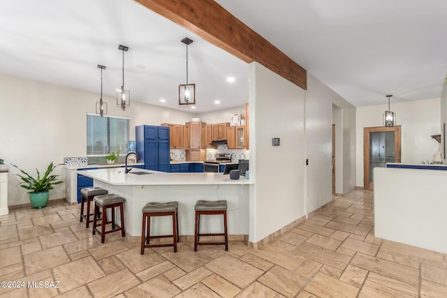 kitchen featuring refrigerator, electric stove, decorative backsplash, decorative light fixtures, and a breakfast bar area