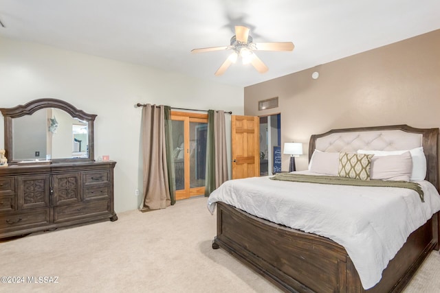 carpeted bedroom featuring access to exterior and ceiling fan