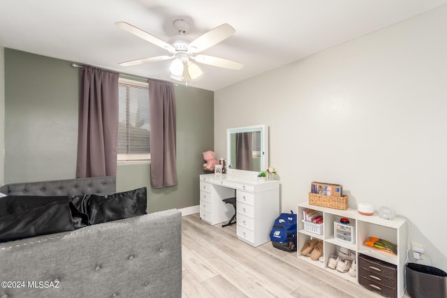 bedroom featuring light hardwood / wood-style floors and ceiling fan