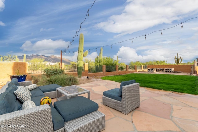 view of patio / terrace with a mountain view