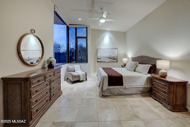 bedroom with floor to ceiling windows and ceiling fan