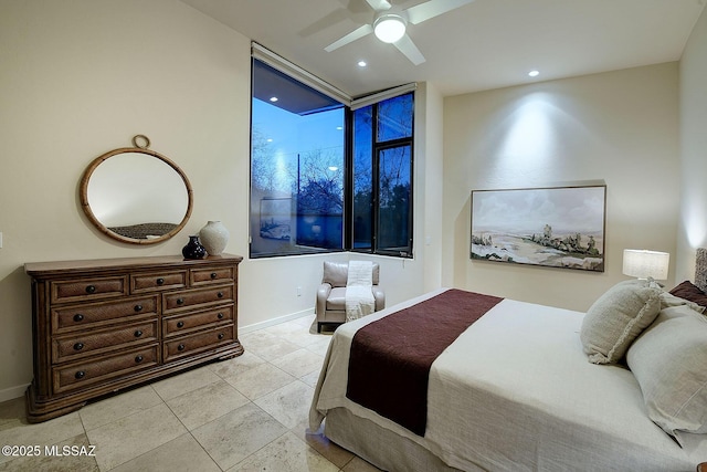 bedroom featuring light tile patterned floors and ceiling fan