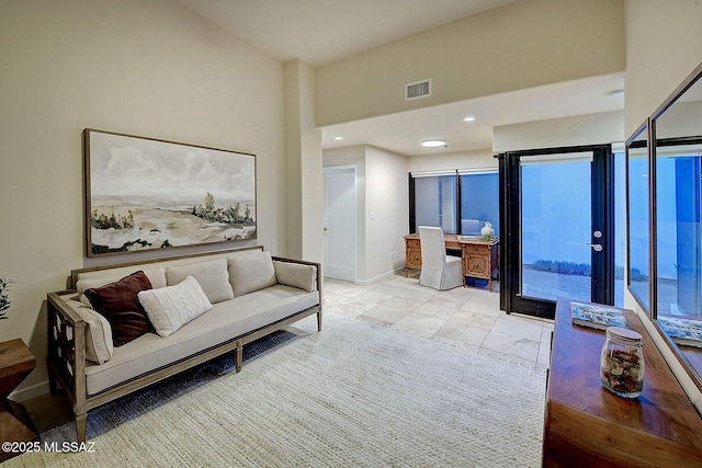 living room featuring light tile patterned floors