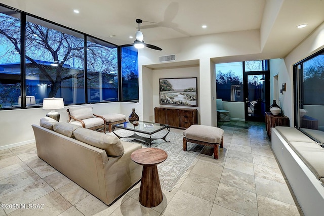 living room with ceiling fan