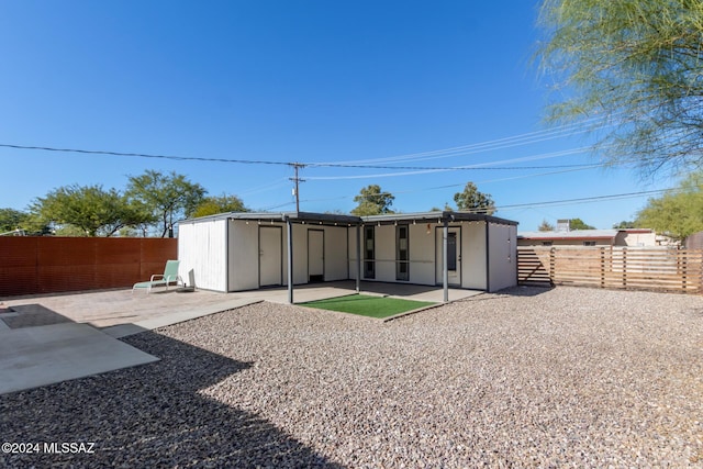 rear view of property with a patio