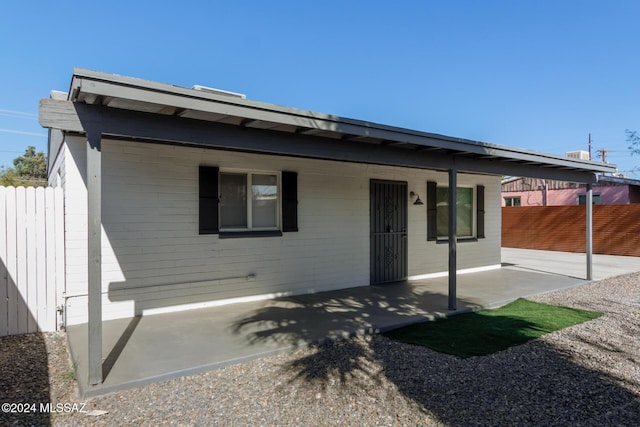 view of front of house featuring a patio