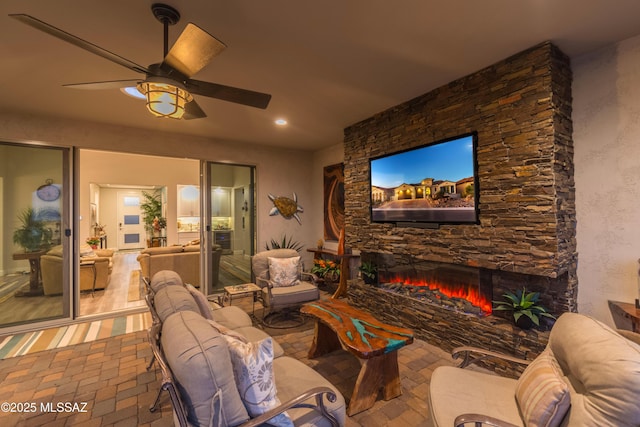 2333 E Copper Valley Way, Green Valley, AZ 85614 - living area with recessed lighting, ceiling fan, and a stone fireplace