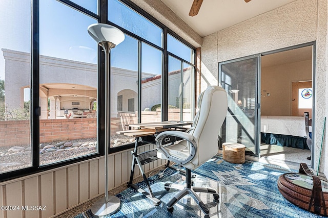 office space with ceiling fan