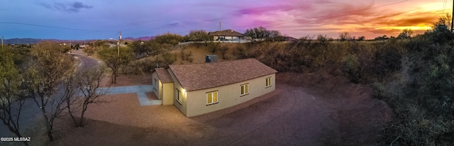 view of aerial view at dusk