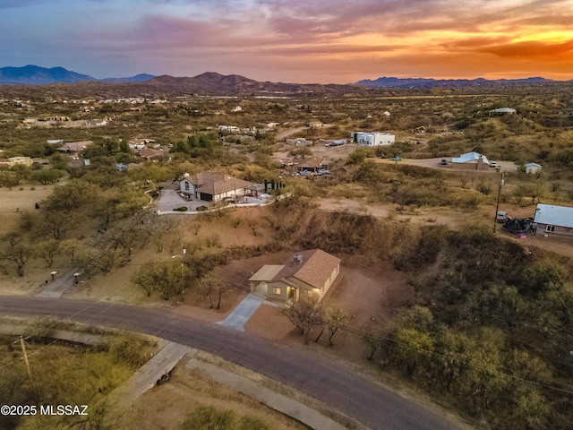 aerial view at dusk with a mountain view