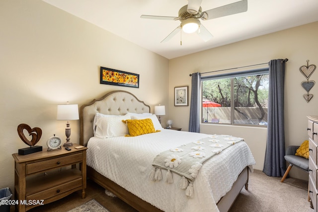 carpeted bedroom with ceiling fan