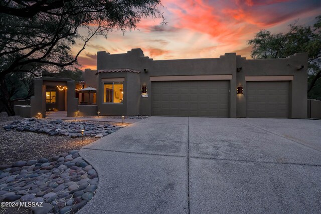 view of pool with a patio area and a hot tub