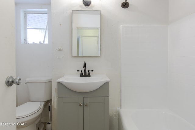 full bathroom featuring vanity, toilet, and shower / bath combination