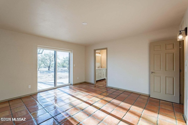 view of tiled spare room