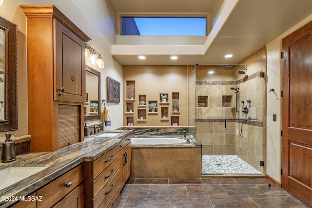 bathroom with vanity and plus walk in shower