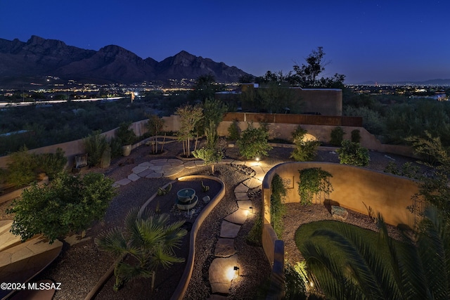 drone / aerial view featuring a mountain view