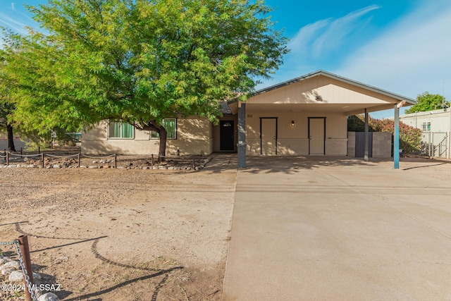 view of front facade with a carport