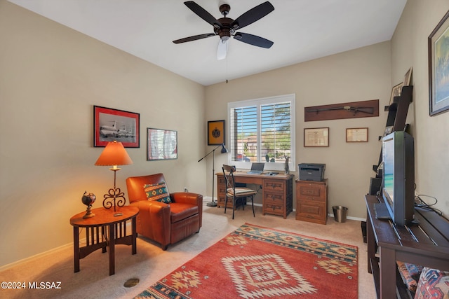 home office with ceiling fan and light colored carpet