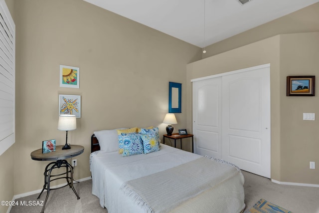 carpeted bedroom featuring a closet