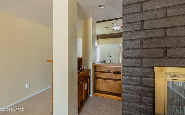 hallway featuring carpet floors