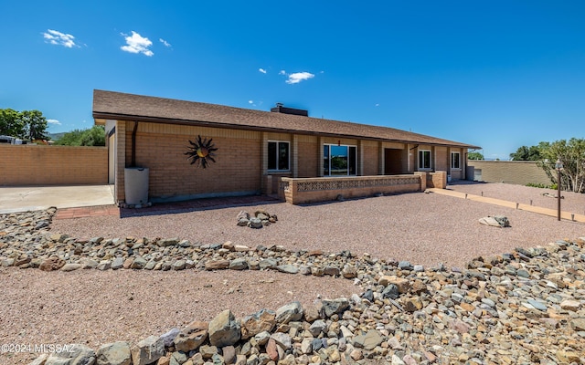 rear view of house featuring a patio area