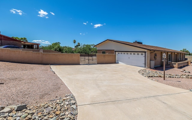 single story home with a garage