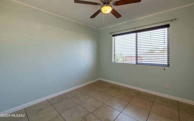 unfurnished room featuring ceiling fan, light tile patterned floors, and crown molding