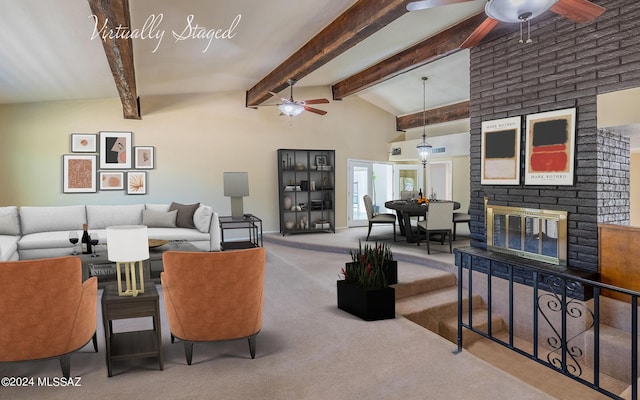 living room featuring lofted ceiling with beams, light colored carpet, and a brick fireplace