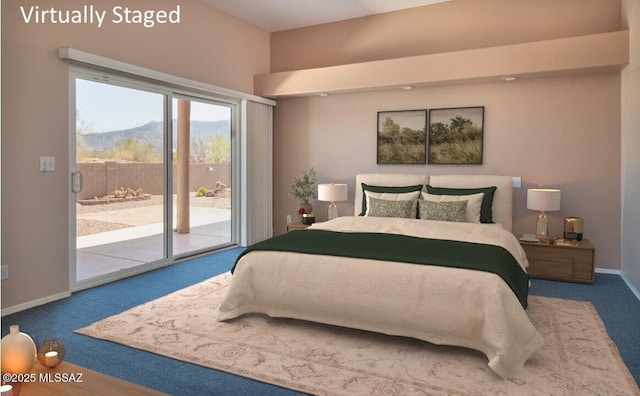 bedroom with carpet floors, access to outside, baseboards, and a mountain view