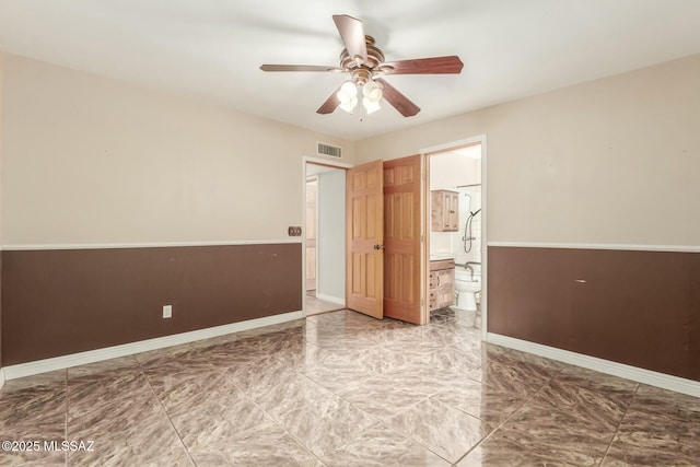 unfurnished room featuring ceiling fan and light hardwood / wood-style flooring