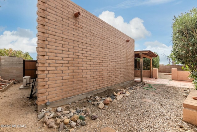 view of home's exterior with a patio