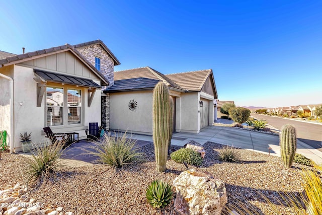 view of front of home featuring a garage