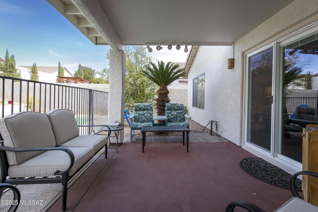 10187 E Watson Dr, Tucson, AZ 85730 - view of patio featuring an outdoor hangout area